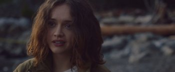 Movie still from “Little Fish” (2020), directed by Chad Hartigan – A person with long brown hair; Close Up shot, Over the shoulder angle