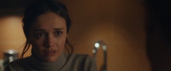 Movie still from “Little Fish” (2020), directed by Chad Hartigan – A woman's face in front of a mirror; Close Up shot, Over the shoulder angle