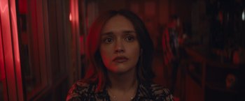 Movie still from “Little Fish” (2020), directed by Chad Hartigan – A person wearing a shirt; Close Up shot, Over the shoulder angle