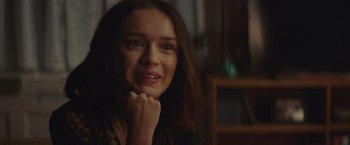 Movie still from “Little Fish” (2020), directed by Chad Hartigan – A person with her hand under her chin; Close Up shot, Over the shoulder angle