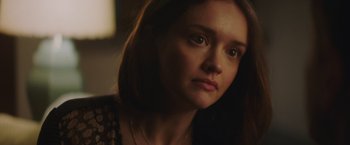 Movie still from “Little Fish” (2020), directed by Chad Hartigan – A person looking at the camera; Close Up shot, Over the shoulder angle