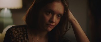 Movie still from “Little Fish” (2020), directed by Chad Hartigan – A woman's face in the dark; Close Up shot, Over the shoulder angle