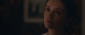 Movie still from “Little Fish” (2020), directed by Chad Hartigan – A person looking at the camera; Close Up shot, Over the shoulder angle