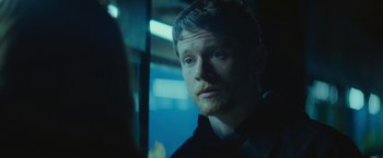 Movie still from “Little Fish” (2020), directed by Chad Hartigan – A person looking at the camera; Close Up shot, Over the shoulder angle