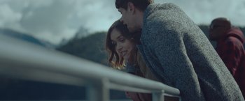 Movie still from “Little Fish” (2020), directed by Chad Hartigan – A man and a woman leaning against a railing; Close Up shot, Over the shoulder angle