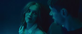 Movie still from “Little Fish” (2020), directed by Chad Hartigan – A woman and a man in a dark room looking at each other; Close Up shot, Over the shoulder angle
