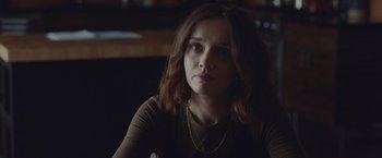 Movie still from “Little Fish” (2020), directed by Chad Hartigan – A woman sitting in front of a window; Close Up shot, Over the shoulder angle