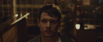 Movie still from “Little Fish” (2020), directed by Chad Hartigan – A person wearing a jacket; Close Up shot, Over the shoulder angle