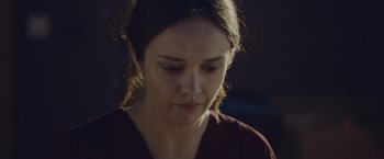 Movie still from “Little Fish” (2020), directed by Chad Hartigan – A person looking down at her face; Close Up shot, Over the shoulder angle