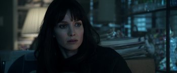 Movie still from “Malignant” (2021), directed by James Wan – A person sitting in a room; Close Up shot, Over the shoulder angle