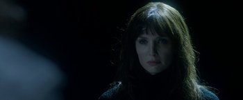 Movie still from “Malignant” (2021), directed by James Wan – A person with long hair; Close Up shot, Low angle