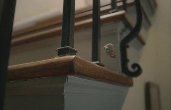 Movie still from “Marcel the Shell with Shoes On” (2021), directed by Dean Fleischer Camp – A bird's eye view of a building; Extreme Close Up shot, High angle