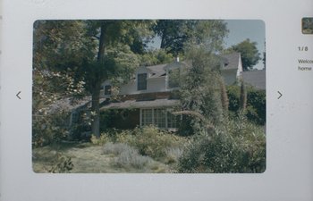 Movie still from “Marcel the Shell with Shoes On” (2021), directed by Dean Fleischer Camp – An old white house with trees in the background; Extreme Wide shot, High angle