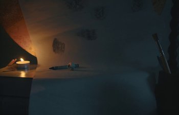 Movie still from “Marcel the Shell with Shoes On” (2021), directed by Dean Fleischer Camp – An image of a pencil in the middle of a room; Extreme Wide shot, High angle