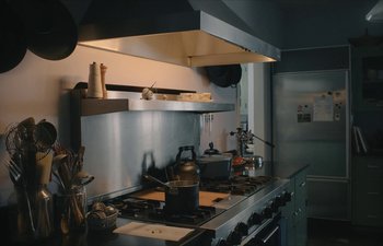 Movie still from “Marcel the Shell with Shoes On” (2021), directed by Dean Fleischer Camp – A kitchen with a stove , oven , and a sink; Extreme Close Up shot, Low angle
