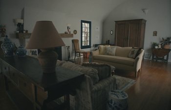 Movie still from “Marcel the Shell with Shoes On” (2021), directed by Dean Fleischer Camp – A living room filled with couches , a table and a lamp; Wide shot, High angle
