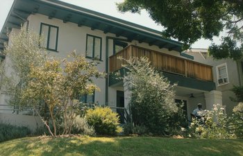 Movie still from “Marcel the Shell with Shoes On” (2021), directed by Dean Fleischer Camp – A house that has a lot of plants in front of it; Extreme Wide shot, Low angle