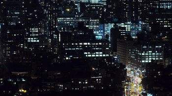 Movie still from “Margin Call” (2011), directed by J.C. Chandor – A view of a city at night from above; Extreme Wide shot, High angle