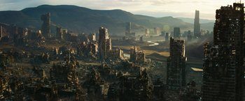 Movie still from “Maze Runner: The Death Cure” (2018), directed by Wes Ball – An aerial view of a city with a river in the background; Extreme Wide shot, High angle