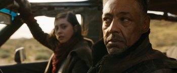 Movie still from “Maze Runner: The Death Cure” (2018), directed by Wes Ball – A man and a woman are sitting on a bus; Close Up shot, Over the shoulder angle