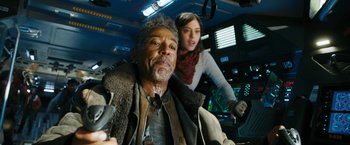 Movie still from “Maze Runner: The Death Cure” (2018), directed by Wes Ball – A man and a woman are in a vehicle; Medium shot, Low angle