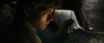 Movie still from “Maze Runner: The Death Cure” (2018), directed by Wes Ball – A person looking out of a car window; Close Up shot, Low angle