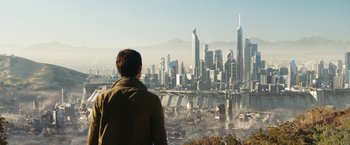 Movie still from “Maze Runner: The Death Cure” (2018), directed by Wes Ball – A man looking out over a city from a hill; Extreme Wide shot, High angle