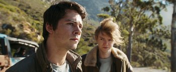 Movie still from “Maze Runner: The Death Cure” (2018), directed by Wes Ball – A man and a woman standing next to each other; Close Up shot, Over the shoulder angle