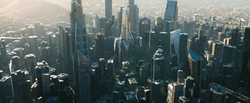 Movie still from “Maze Runner: The Death Cure” (2018), directed by Wes Ball – An aerial view of a city with skyscrapers; Extreme Wide shot, High angle