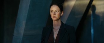 Movie still from “Maze Runner: The Death Cure” (2018), directed by Wes Ball – A woman in a black jacket looking at the camera; Close Up shot, Low angle