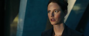 Movie still from “Maze Runner: The Death Cure” (2018), directed by Wes Ball – A person wearing a suit and tie; Close Up shot, Over the shoulder angle