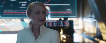 Movie still from “Maze Runner: The Death Cure” (2018), directed by Wes Ball – A woman in a white jacket is looking at a monitor; Close Up shot, Over the shoulder angle