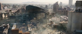Movie still from “Maze Runner: The Death Cure” (2018), directed by Wes Ball – An aerial view of an industrial area in a city; Extreme Wide shot, Overhead angle