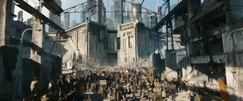 Movie still from “Maze Runner: The Death Cure” (2018), directed by Wes Ball – A group of people standing in front of a large building; Extreme Wide shot, High angle