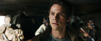 Movie still from “Maze Runner: The Death Cure” (2018), directed by Wes Ball – A person wearing a jacket; Close Up shot, Low angle