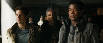 Movie still from “Maze Runner: The Death Cure” (2018), directed by Wes Ball – A group of men standing next to each other; Close Up shot, Low angle