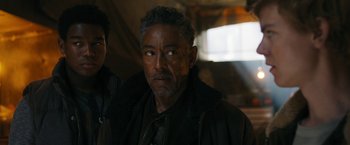 Movie still from “Maze Runner: The Death Cure” (2018), directed by Wes Ball – A person wearing a jacket; Close Up shot, Over the shoulder angle