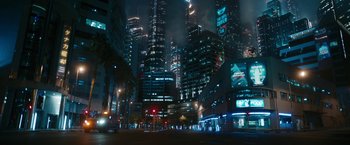 Movie still from “Maze Runner: The Death Cure” (2018), directed by Wes Ball – A city street at night lit up by lights; Extreme Wide shot, Low angle