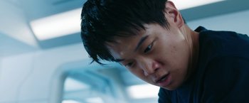 Movie still from “Maze Runner: The Death Cure” (2018), directed by Wes Ball – A person with short black hair; Close Up shot, Low angle