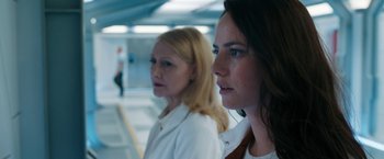 Movie still from “Maze Runner: The Death Cure” (2018), directed by Wes Ball – Two women standing next to each other in a building; Close Up shot, Over the shoulder angle