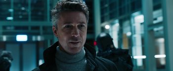 Movie still from “Maze Runner: The Death Cure” (2018), directed by Wes Ball – A person wearing a jacket; Close Up shot, Over the shoulder angle