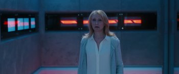 Movie still from “Maze Runner: The Death Cure” (2018), directed by Wes Ball – A woman standing in front of a building at night; Medium shot, Low angle