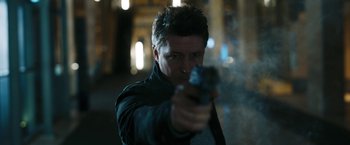 Movie still from “Maze Runner: The Death Cure” (2018), directed by Wes Ball – A man is holding a gun in his hand; Close Up shot, Low angle