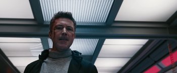 Movie still from “Maze Runner: The Death Cure” (2018), directed by Wes Ball – A person wearing a sweater; Close Up shot, Low angle