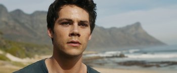 Movie still from “Maze Runner: The Death Cure” (2018), directed by Wes Ball – A man's face on the beach; Close Up shot, Low angle