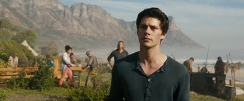 Movie still from “Maze Runner: The Death Cure” (2018), directed by Wes Ball – A man standing in front of a group of people; Medium shot, Over the shoulder angle