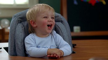 Movie still from “Meet the Fockers” (2004), directed by Jay Roach – A little boy that is sitting at a table; Close Up shot, High angle