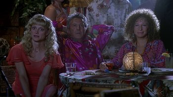 Movie still from “Meet the Fockers” (2004), directed by Jay Roach – A group of people sitting around a table; Medium shot, Over the shoulder angle