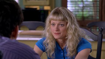 Movie still from “Meet the Fockers” (2004), directed by Jay Roach – A woman sitting at a table in front of a window; Close Up shot, Over the shoulder angle