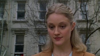 Movie still from “Meet the Parents” (2000), directed by Jay Roach – A woman with long blonde hair wearing a brown jacket; Close Up shot, Low angle